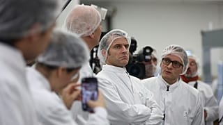 French President Emmanuel Macron visits the plant of Danish pharmaceutical company Novo Nordisk in Chartres, south west of Paris, Thursday, Nov. 23, 2023.