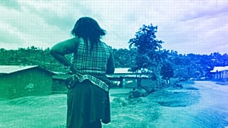 A woman stands near her home in Beni, eastern Congo, March 2021