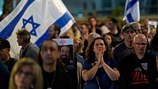 People participate in a show of solidarity with hostages being held in the Gaza Strip, near the Museum of Art in Tel Aviv, Israel, Saturday, Nov. 25, 2023