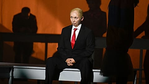 Bulgarian artist Radena Valkanova performs on stage in the role of Russian President Vladimir Putin, during the play "Haga" at the National Theatre Ivan Vzaov in Sofia. 