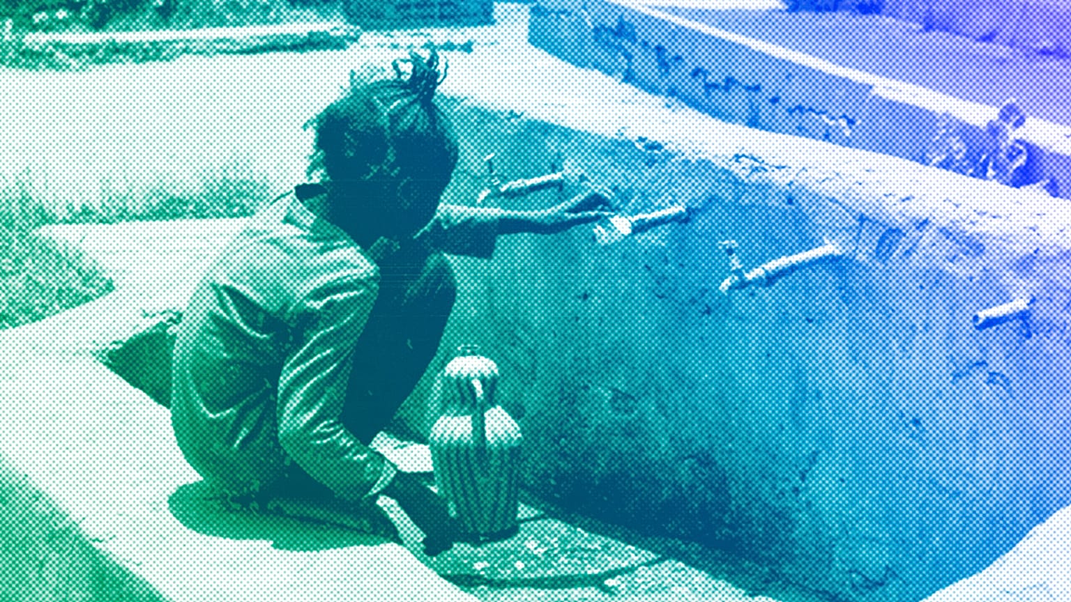 A displaced child fills a jug with water in al-Hasahisa south of Khartoum, July 2023