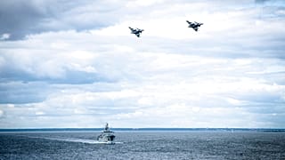 In this photo provided by the Swedish Armed Forces on Tuesday, Aug. 25, 2020, troops patrol by both air and sea in the Baltic Sea region. 