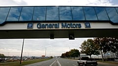 A trucks passes below a walkway at the General Motors Oshawa, Canada assembly plant