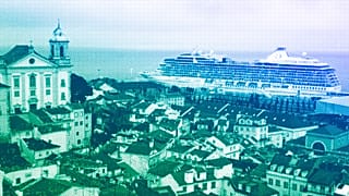 The cruise ship MS Marina is docked by Lisbon's old Alfama neighborhood, in the foreground, October 2022