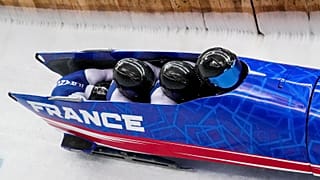 FILE: Team France slide during the 4-man bobsleigh at the 2022 Winter Olympics, Sunday, Feb. 20, 2022, in the Yanqing district of Beijing.