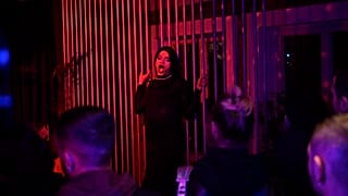 A drag performer performs on stage at the only LGBT pub Bubble in Pristina on November 4, 2023
