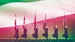  Hungarian soldiers march, backdropped by a large display showing Hungary's national flag in Budapest, March 2018