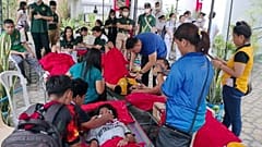 n this handout photo provided by the Philippine Red Cross, volunteers attend to people affected by an earthquake that struck General Santos City, South Cotabato.