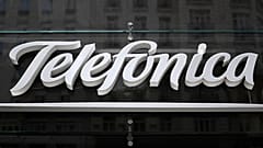A picture shows the logo of Spanish multinational broadband and telecommunications company Telefonica in Madrid on August 23, 2018. 