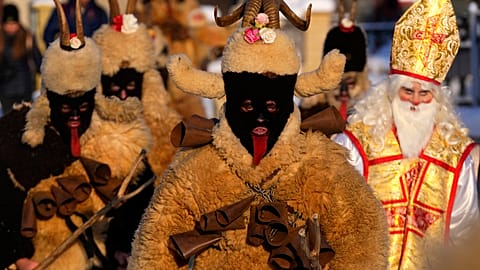 Revelers take part in a traditional St. Nicholas procession in the village of Lidecko, Czech Republic, Monday, Dec. 4, 2023. 