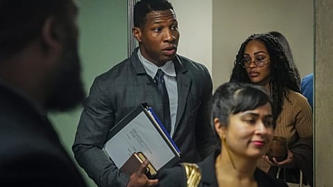 Actor Jonathan Majors, center, arrives at court for his domestic abuse trial - Tuesday 5 Dec. 2023, in New York