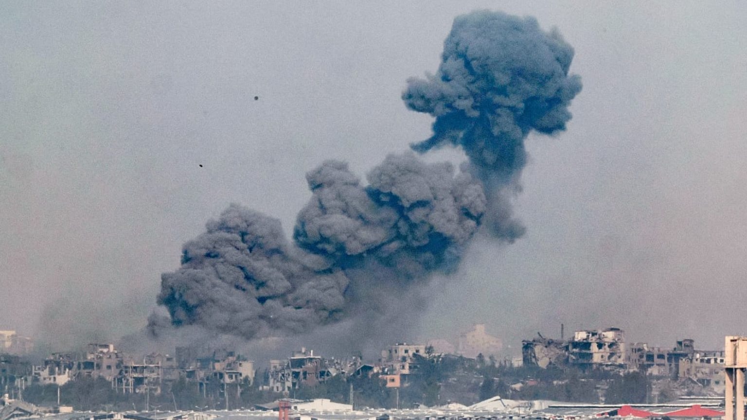 A picture taken from southern Israel near the border with the Gaza Strip on December 6, 2023, shows smoke billowing during Israeli bombardment in Gaza. 
