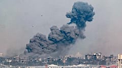 A picture taken from southern Israel near the border with the Gaza Strip on December 6, 2023, shows smoke billowing during Israeli bombardment in Gaza. 