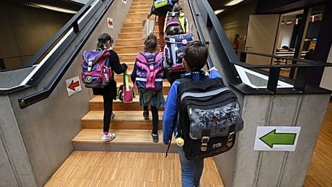 Pupils walk upstairs to go to their classroom at the European school of Strasbourg in eastern France
