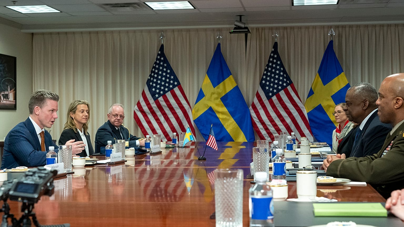 Swedish Defense Minister Pal Jonson, left, speaks during a meeting with Defense Secretary Lloyd Austin, right, at the Pentagon on Tuesday, Dec. 5, 2023, in Washington. 