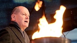 German Chancellor Olaf Scholz attends the ceremony to light the first candle of Hanukkah menorah at Brandenburg Gate in Berlin, Germany, Thursday, Dec. 7, 2023