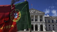 A Portuguese flag flies in front of the Parliament in Lisbon on November 7, 2023.