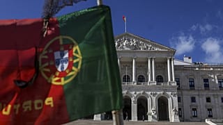 A Portuguese flag flies in front of the Parliament in Lisbon on November 7, 2023.