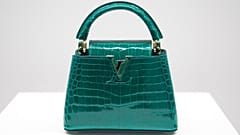 A picture taken on February 22, 2022 shows a Louis Vuitton Capucines handbag displayed during the inauguration of the Louis Vuitton workshop named "L'Abbaye" in Vendome, centr