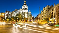 Gran Via in Madrid at dusk.