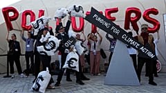 Activists protest against fossil fuels at COP28.