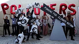 Activists protest against fossil fuels at COP28.