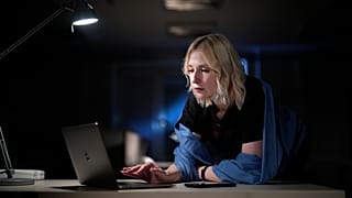 Yekaterina Duntsova, a Russian journalist checks her emails after an interview with the Associated Press in Moscow