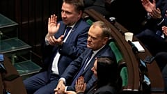 The leader of Poland's opposition Donald Tusk, center, after Poland's government losing a confidence vote at the parliament in Warsaw, Poland, Dec 11, 2023