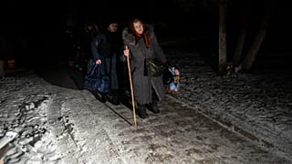 Thousands of people travel to Ukraine from territories held by Russia through an unofficial crossing point between the two countries amid a brutal war.