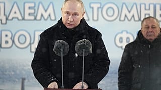 Picture distributed by Russian state agency Sputnik shows Vladimir Putin  attending a flag-rising ceremony at Sevmash shipyard on December 11, 2023.