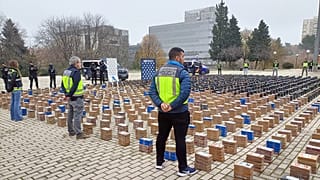 This image taken on December 12, 2023 shows a total of 11 tonnes of cocaine in plastic-wrapped packs from two seizures made by police in Valencia and Vigo.