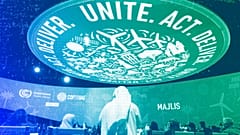 Delegates arrive for a meeting at the COP28 UN Climate Summit in Dubai, December 2023