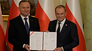 Президент Польши Анджей Дуда и новоизбранный премьер Дональд Туск