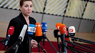 Denmark's Prime Minister Mette Frederiksen speaks with the media as she arrives for an EU summit at the European Council building in Brussels, Thursday, Dec. 14, 2023