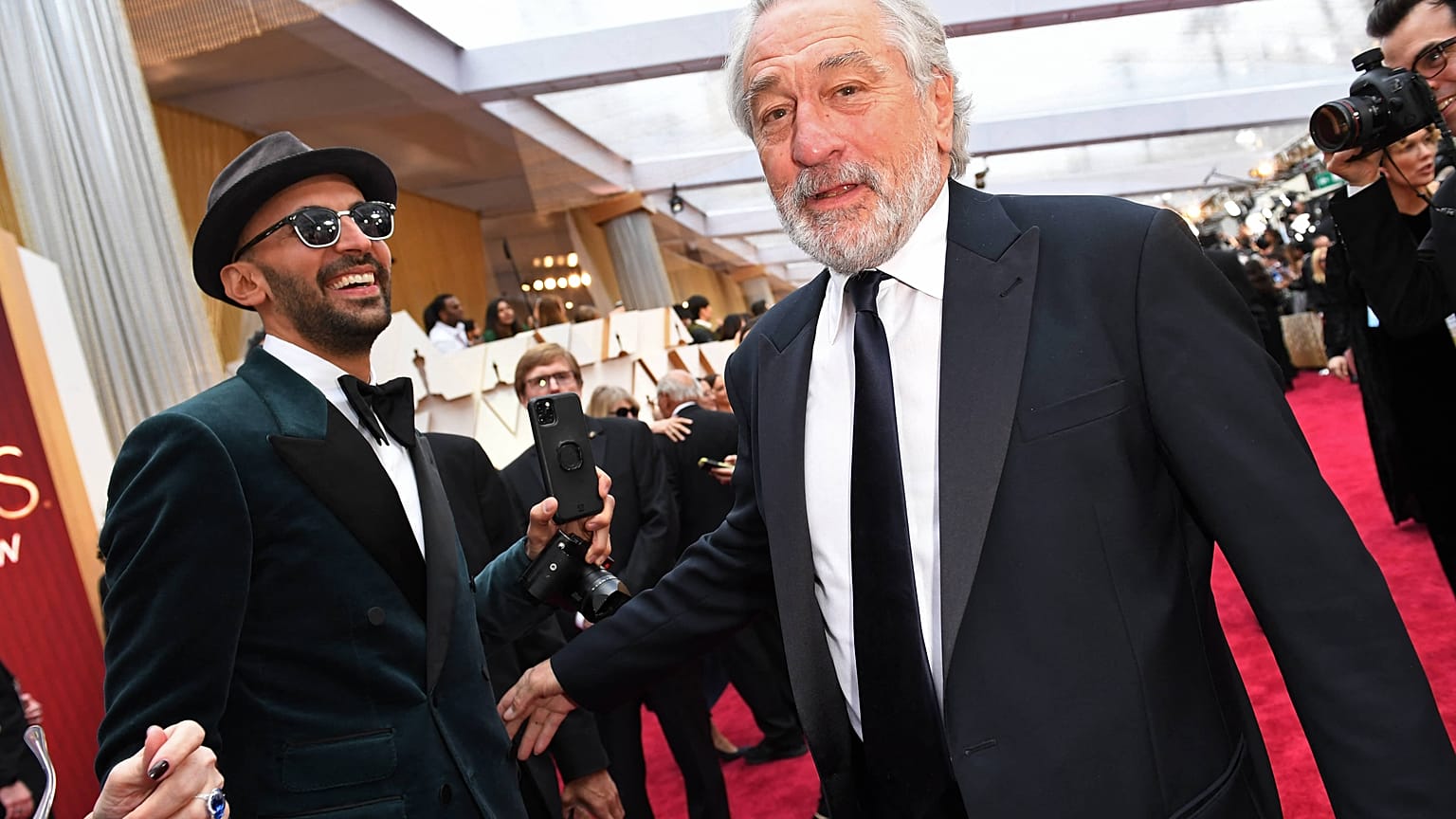 Oscar winner Robert De Niro and French street artist JR are working on an intimate documentary about De Niro's father.