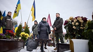 Ukrainian President Volodymyr Zelensky visiting the graves of Ukrainian soldiers at the Lychakiv Cemetery in Lviv, 15 December 2023