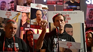 Bring them home: Ruby Chen, father of Israeli hostage Itay, held in Gaza since the 7 October attack, lifts an hourglass while delivering statement to media in Tel Aviv