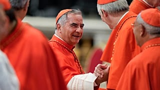 Cardinal Angelo Becciu attends a consistory inside St. Peter's Basilica, at the Vatican in August