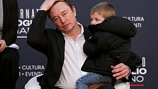 Tesla's CEO Elon Musk, holding his son, attends the annual political festival Atreju, organised by the Brothers of Italy political party, in Rome, December 16th 2023