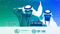 COP28 President Sultan al-Jaber adjusts his ghutra at a stocktaking plenary session at the COP28 UN Climate Summit in Dubai, December 2023
