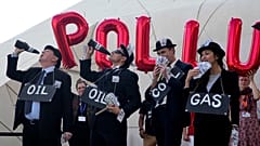 Activists protest against fossil fuels at the COP28 U.N. Climate Summit, Sunday, Dec. 10, 2023, in Dubai, United Arab Emirates.