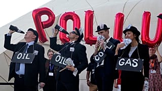 Activists protest against fossil fuels at the COP28 U.N. Climate Summit, Sunday, Dec. 10, 2023, in Dubai, United Arab Emirates.