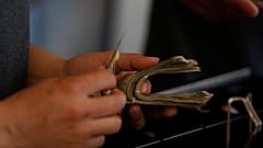 File photo of someone counting money
