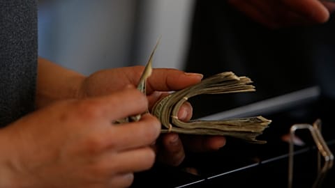File photo of someone counting money