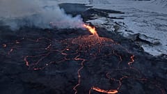A view of the Southern active segment of the original fissure of an active volcano in Grindavik on Iceland's Reykjanes Peninsula, Tuesday, Dec. 19, 2023.