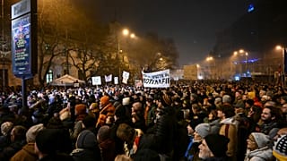 People take part in a protest against scrapping the special prosecutor's office in Bratislava, Tuesday 19 December