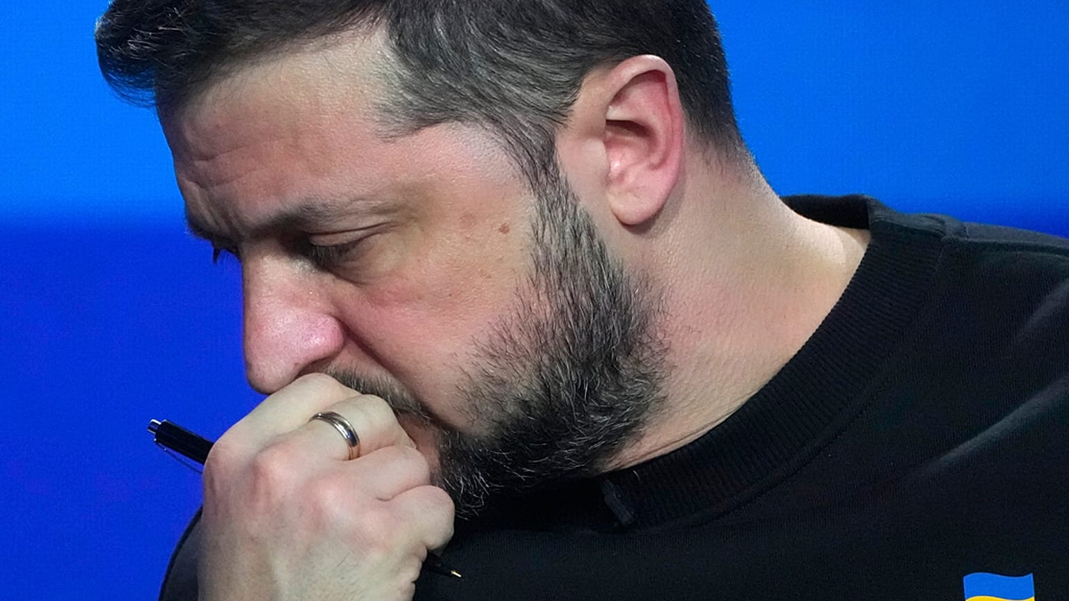 Ukrainian President Volodymyr Zelenskyy reacts during his end-of-the-year news conference in Kyiv, Ukraine, Tuesday, Dec. 19, 2023