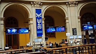 Brokers work at the Stock Exchange in Madrid (file photo)