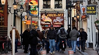 Advertisements for sex shop are seen in Amsterdam's Red Light district.