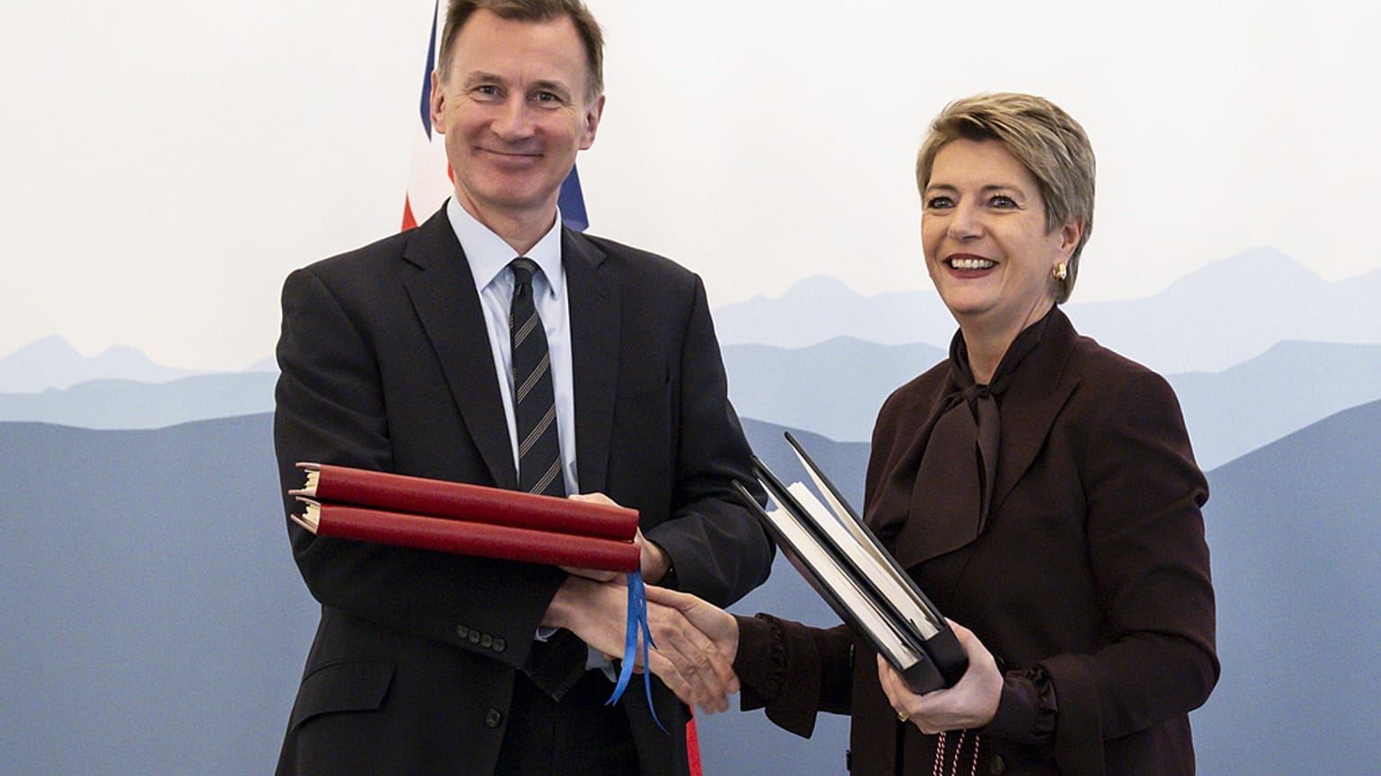 British finance minister Jeremy Hunt and his Swiss counterpart Karin Keller-Sutter
